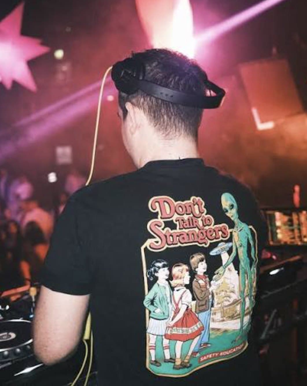 The floor seen from behind the DJ booth.